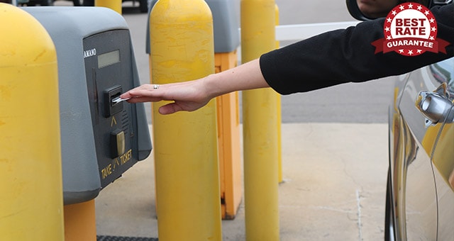 Customer paying for airport shuttle transportation services in Romulus, MI